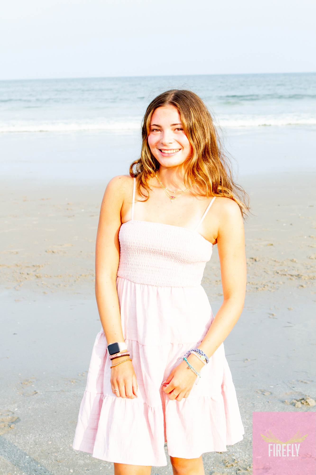 Teen girl beach portrait in soft summer light